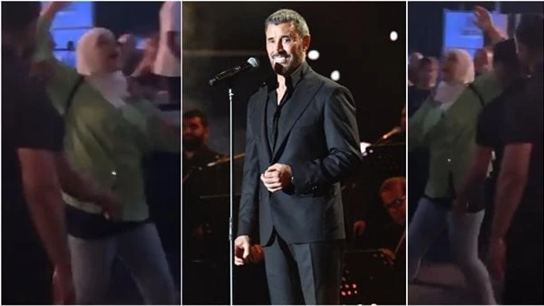 معجبة تحاول اقتحام مسرح حفل كاظم الساهر في لبنان.. شاهد تهافت عدد من المعجبات على الفنان كاظم الساهر، في الحفل الذي أحياه ليلة أمس الجمعة 5 يوليو في العاصمة اللبنانية بيروت، ضمن سل