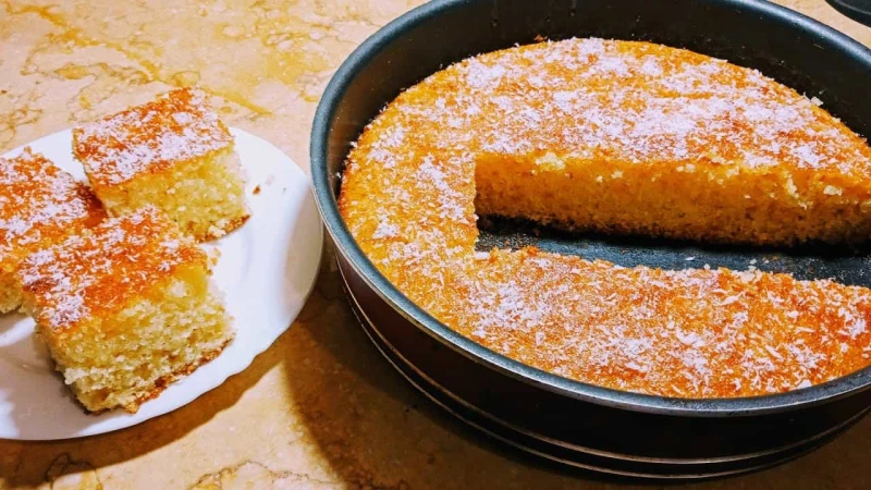 طعمها لذيذ وبمقادير مظبوطة .. طريقة عمل كيكة الرواني بالسميد في البيت واحدة من بين الحلويات الشهية التي يتم تقديمها في المنزل لجميع أفراد الأسر