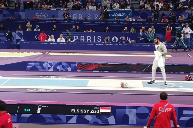 زياد السيسي يتأهل إلى ربع نهائي سلاح السيف في أولمبياد باريس 2024تأهل المصنف أول عالميا وبطل منتخب مصر للسلاح زياد السيسى إلى دور ربع نهائي أولمبياد باريس 2024 بعد فوزه على بطل أمر