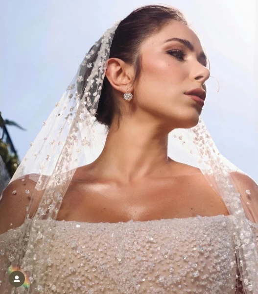 صور تنشر للمرة الأولى من زفاف دانييلا رحمة وناصيف زيتون افاق عربية - شاركت الفنانة اللبنانية دانييلا رحمة متابعيها على شبكات التواصل الاجتماعي، لقطات