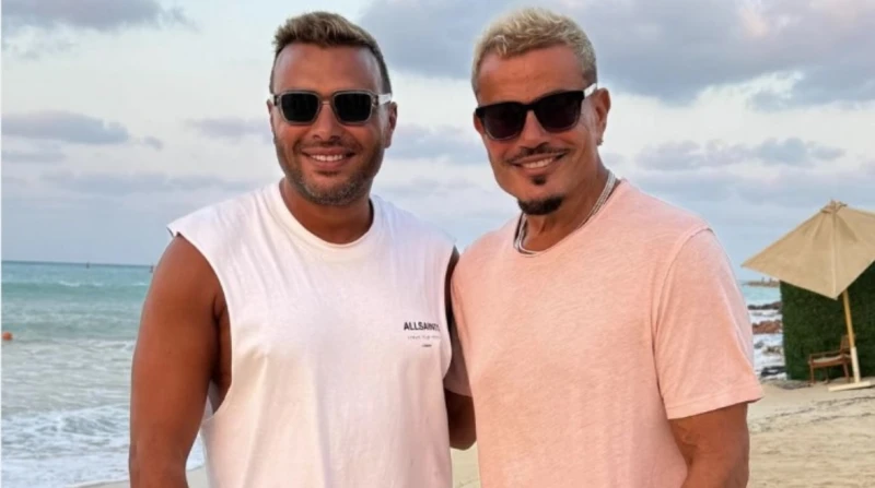 تفاعل كبير مع صورة الهضبة وصبري: عمرو ورامي أخوات شارك الفنان رامي صبري صورة برفقة الفنان عمرو دياب خلال تواجدهما في العطلة الصيفية بالساحل