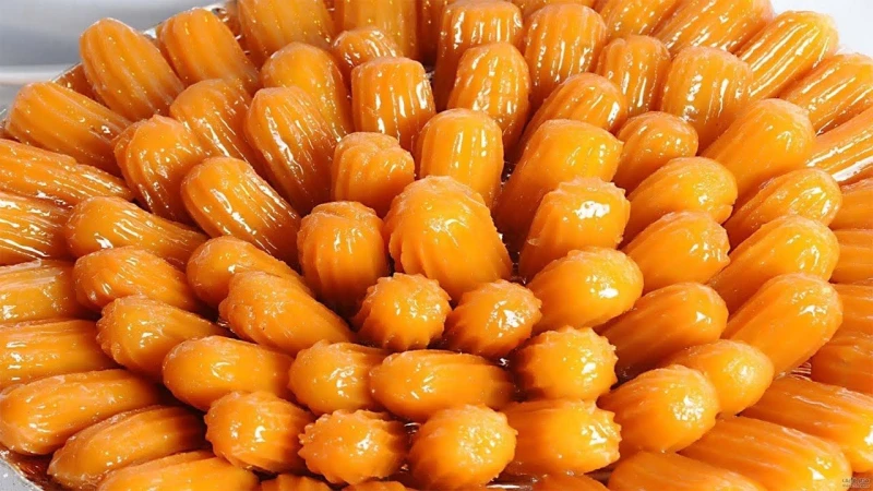 بأسهل الخطوات.. طريقة عمل بلح الشام المقرمش بمقادير مضبوطة أحلى من الجاهزبلح الشام من الحلويات اللذيذة التي يعشقها الجميع والمحببة لديهم، ويقدم دائما