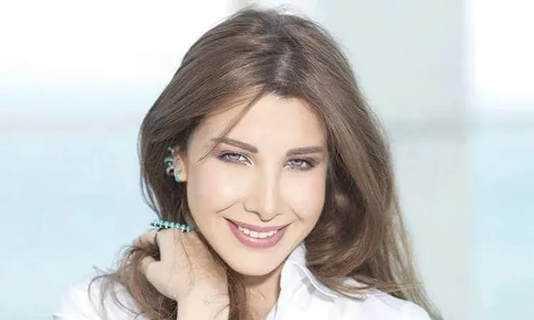 فن: نانسي عجرم: الوجوه العربية بالأولمبياد تحقق إنجازات كبيرة اقرأ في أفاق عربية نانسي عجرم الوجوه العربية بالأولمبياد تحقق إنجازات كبيرة، وجهت