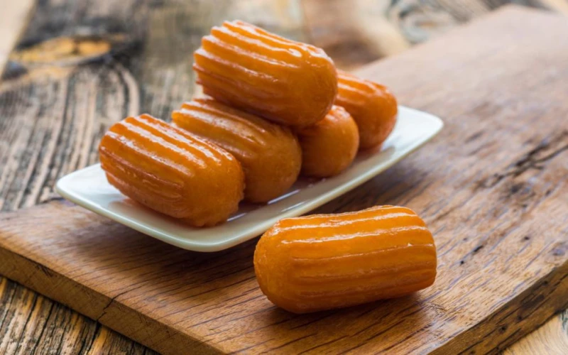 طريقة عمل بلح الشام.. وصفة سهلة ولذيذة لتحضير الحلوى الشرقية الشهيرةبلح الشام هو واحد من أشهر الحلويات الشرقية التي تتميز بطعمها الحلو وقوامها