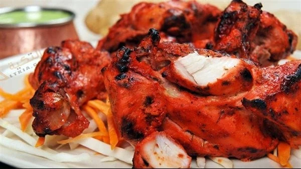 زي المطاعم .. طريقة عمل الدجاج التندورييعد الدجاج التندوري من أشهى الأكلات المقدمة في المطاعم الكبري وتكلفته مرتفعة .. فكيف تعديه فى المنزل بمذاق