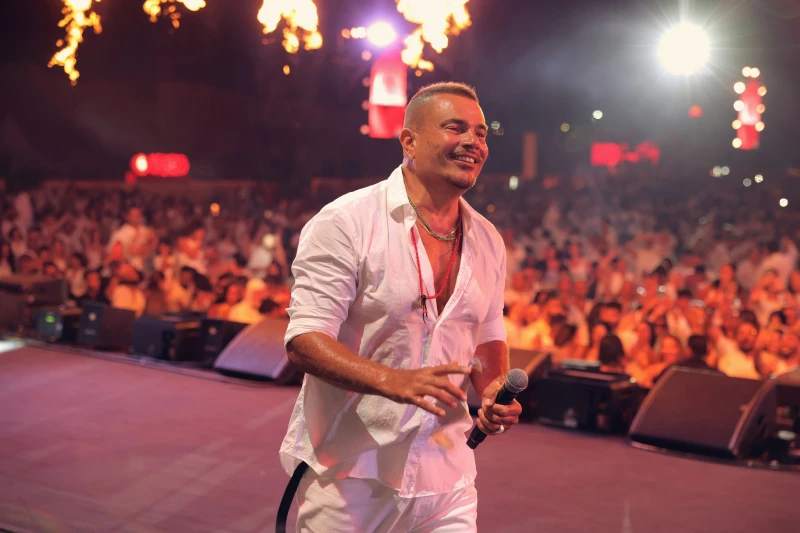 أول رد من أنغامي بعد حذف اغاني عمرو دياب عن المنصة تفاجأ جمهور الفنان المصري، عمرو دياب، بحذف عدد من ألبوماته وأغانيه المنفردة عبر تطبيق أنغامي، ما أثار التساؤلات بين المتابعين الذ