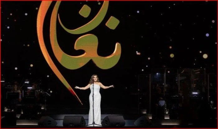 صوت مصر.. لقطات من حفل أنغام في جدةتألقت الفنانة أنغام، في حفلها الأخير الذي أقامته مساء الجمعة، على مسرح عبادي الجوهر آرينا، في جدة بالسعودية، بقيادة المايسترو هاني فرحات، وسط حضو