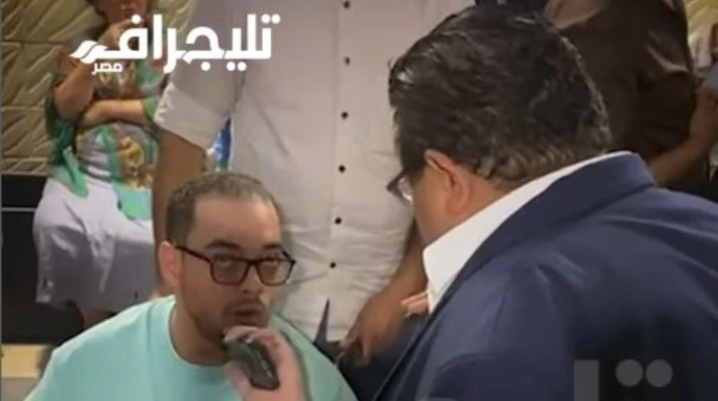 خالد جلال في لفتة إنسانية مع شاب من ذوي الهمم بمهرجان إيزيس