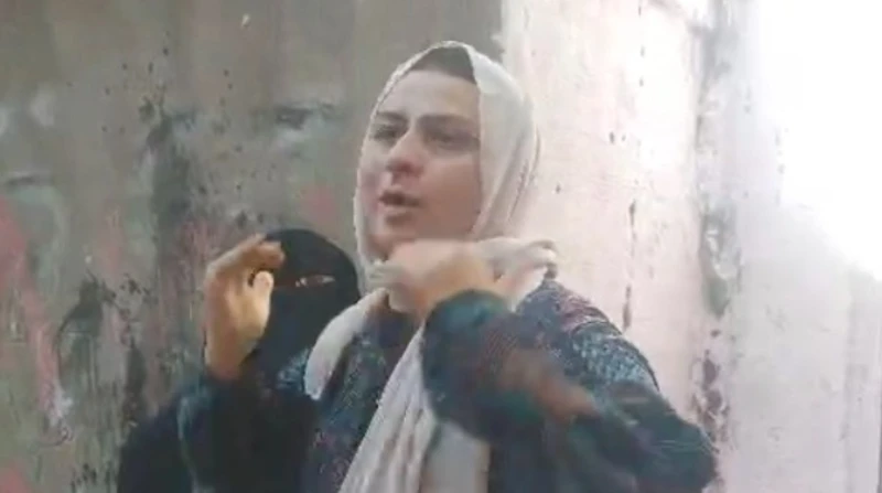 أول تعليق من سيدة كفر الشيخ بعد اتهامها بمنع جارها من دخول منزله