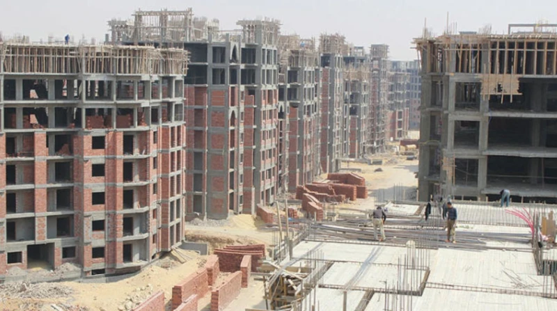 نجيب ساويرس يحذر من ركود محتمل في السوق العقاري، ما الأسباب؟