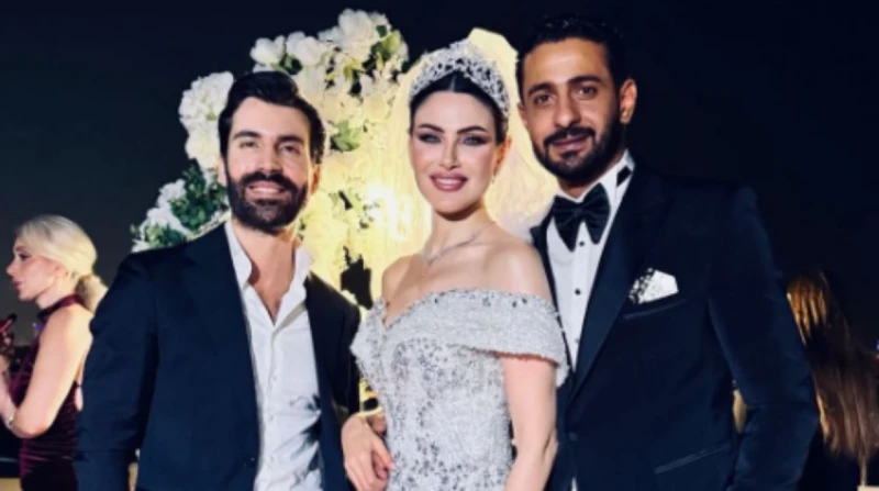 بفستان أبيض مطرز، دارين حداد تشارك جمهورها باقة صور من حفل زفافها