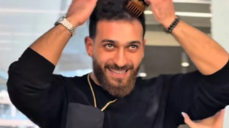 "قصينا الخوف"، كوافير لبناني يحلق شعره دعمًا لمريضة سرطان (فيديو)