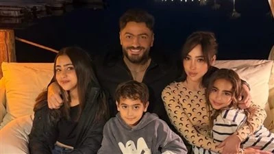 بسمة بوسيل تحتفل بالعام الجديد رفقة طليقها تامر حسني وأبناءهم| صور