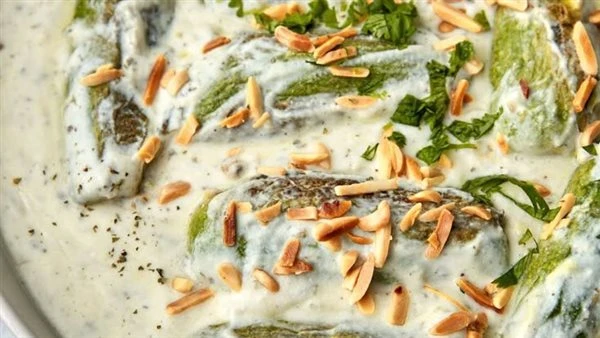 صينية كوسة بالزبادي والليمون في الفرن، وصفة غير تقليدية للغداء