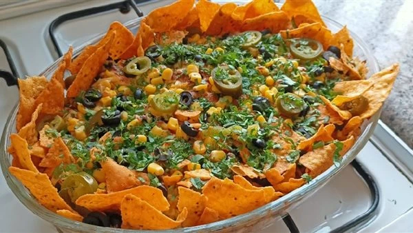 ناتشوز سوبريم محمّلة.. وصفة جبنية شهية لعشاق السناك السريع